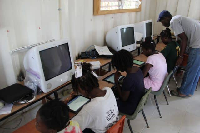 The girls trying out the new Android tablets in the classroom.