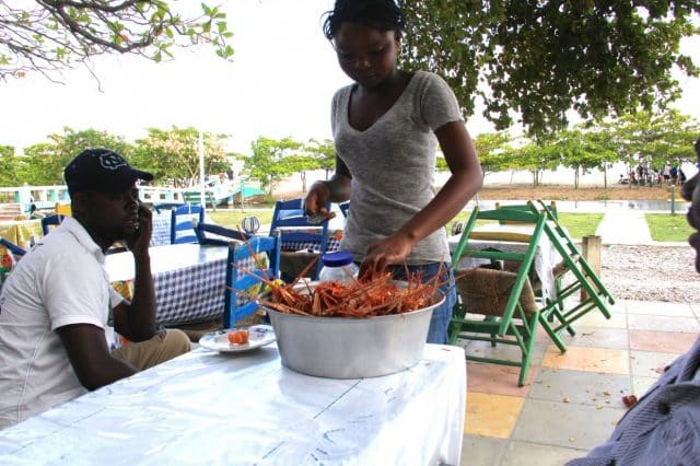 Lobster and fish dinner on the beach in Les Cayes