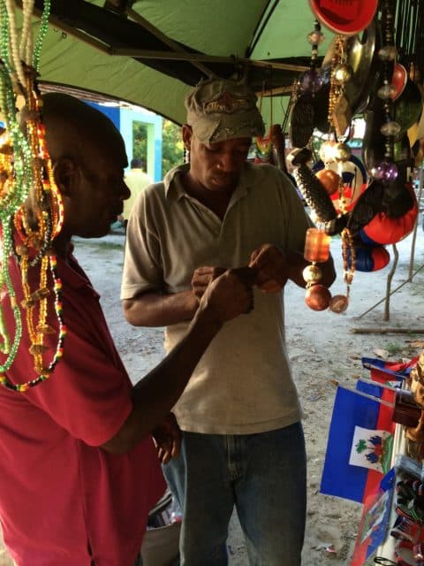 Port Salut artist making bracelets for our grand daughters. 