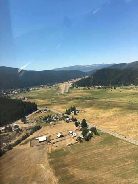 Quincy Gansner Field 2O1 - On Final for Runway 25 - The road in the foreground is Quincy Junction which leads to the Spanish Trailhead